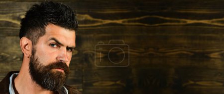 Photo for Beard man with classic long beard, bearded gay. Barber barbershop. Mustache men. Templates web banner design. Horizontal banner for website header with text copy space, on wooden vintage background - Royalty Free Image