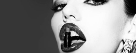 Photo for Fashion lipstick store - shopping and sale. Open mouth with lipstick. Women lips with red lipstick. Seductive girl showing lips. Beauty woman - Royalty Free Image