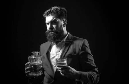 Photo for Fashionable man in white shirt and suspenders. Man drinking alcohol from glass. Alcohol Drink. Drinking whiskey or brandy or cognac - Royalty Free Image