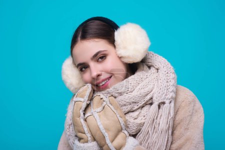 Photo for Playful Winter. Woman in winter warm hat. Portrait of happy girl in winters clothes. Girl in cloth. Young woman in winter coat knitted sweater scarf and hat. Winter cold season - Royalty Free Image