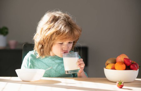 Photo for Child drinking milk glass. Close up of cute little boy kid drink tasty organic milk with vitamins calcium from glass. Small child enjoy delicious nutritious lactose free yoghurt. Healthcare concept - Royalty Free Image