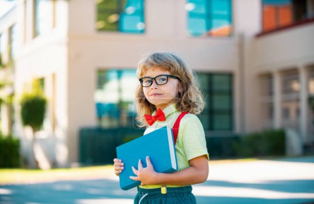 Photo for Back to school. Cute child girl with backpack going to school with fun - Royalty Free Image