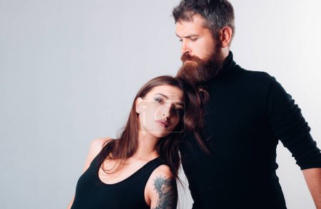 Photo for Couple in love. brutal bearded man and woman with tattoo. hairdresser and barbershop. tattoo salon. male beard care. hipster man with sexy girl. relationship. fashion couple. copy space. - Royalty Free Image