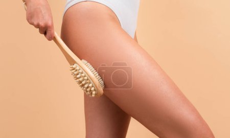 Photo for Female buttocks. Skin treatment. Anti-cellulite body massage for leg and butt. Spa and wellness, body care, cosmetology - Royalty Free Image
