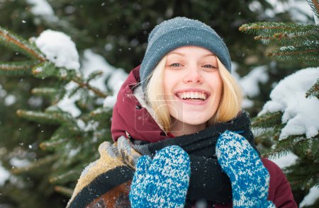 Photo for Woman blond hair smiling snowy winter nature background. Christmas and new year. Model tender girl warm hat scarf. Winter fashion concept. Happy girl playing snow winter day. Enjoying wintertime. - Royalty Free Image