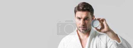 Photo for Cosmetic products. Beauty man presentation cosmetic cream. Natural cosmetics cream, spa beauty products. Man advertising cosmetics cream for male skin care. Cream for male skin. Mens skincare. Banner - Royalty Free Image
