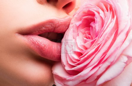 Photo for Girl open mouths. Natural beauty lips. Beautiful woman lips with rose - Royalty Free Image