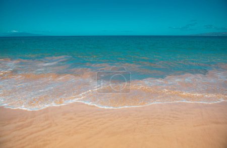 Photo for Sea background, nature of tropical summer beach with rays of sun light. Sand beach, sea water with copy space, summer vacation concept - Royalty Free Image