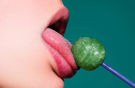 Photo for Sexy woman mouth with pink lips holding lollipop, beauty closeup. Sexy girl suck lick lollipop. Beauty glamour concept, close-up - Royalty Free Image