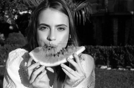 Photo for Beautiful young woman with watermelon. Young stylish lady in the park with a watermelon. Summer portrait of young girl - Royalty Free Image