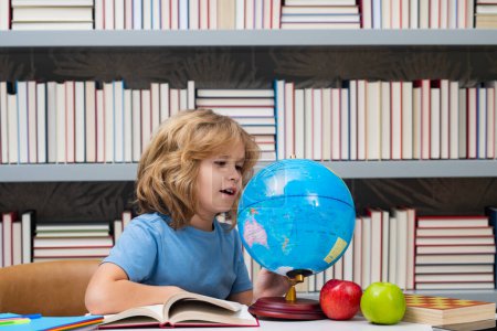Photo for Child from elementary school with book. Little student, clever nerd pupil ready to study. First time to school. Concept of education and learning - Royalty Free Image