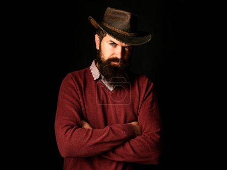 Foto de Retrato de vaquero occidental. Rodeo del salvaje oeste. Hombre de estilo vintage. Vaqueros americanos - Imagen libre de derechos