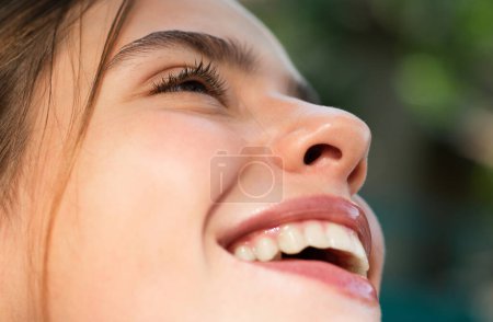Photo for Laughing woman. Portrait of happy smiling girl. Cheerful young beautiful girl smiling laughing outdoor. Emotional face closeup - Royalty Free Image