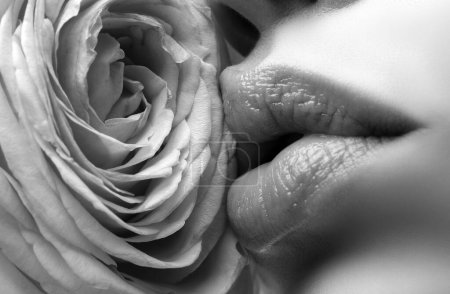 Photo for Sensual Lips closeup. Beautiful woman lips with rose - Royalty Free Image