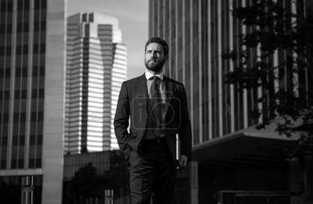 Photo for Businessman with success business. Outdoors portrait male model in suit. Businessman walking - Royalty Free Image