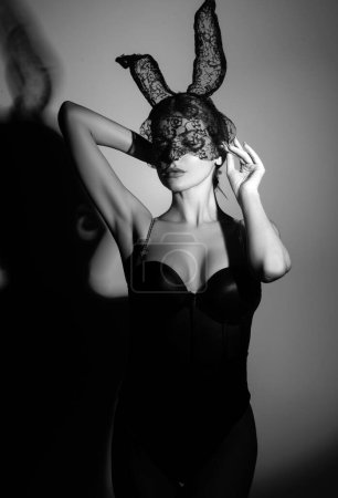 Sexy fashion woman posing in bunny ears. Sensual bunny woman