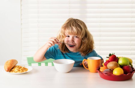 Photo for Child boy eating organic healthy food. Healthy vegetables with vitamins. Proper kids nutrition concept - Royalty Free Image