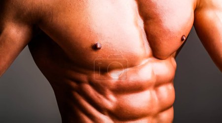 Photo for Muscular sexy man. Naked shape body, strong man. Closeup Male chest. Muscled torso with abs. Man showing muscular sixpack abs. six pack abs muscle. Fit male belly. Strong and Power Six pack Abs - Royalty Free Image
