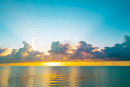 Photo for Sea beach with sky sunset or sunrise. Cloudscape over the sunset sea. Sunset at tropical beach. Nature sunset landscape of idyllic heaven sea - Royalty Free Image