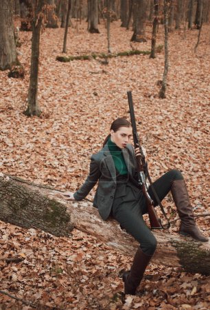 female with a gun. military fashion. achievements of goals. girl with rifle. chase hunting. Gun shop. female hunter in forest. woman with weapon. Target shot. successful hunt. hunting sport.