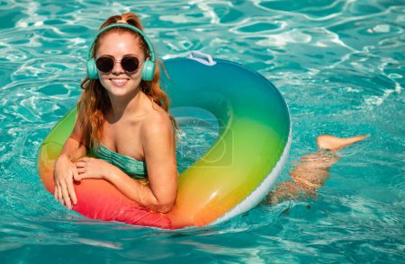 Photo for Woman on swim ring. Summer mood concept. Pool resort. Summertime days. Vacation, summer holiday - Royalty Free Image