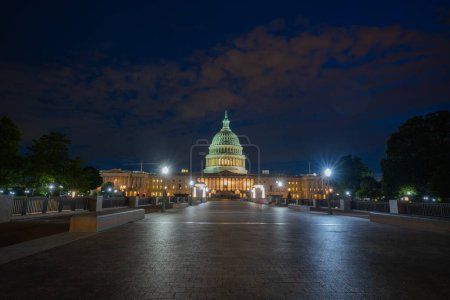 Photo for Capitol building in Washington DC. Capitol Hill commands attention. Capitols neoclassical structure impresses. Neoclassical Capitol houses democracy - Royalty Free Image