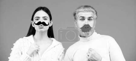Photo for Transgender gender identity, equality and human rights. Concept of gender equality, equal rights for both sexes. Male female portrait. Funny couple of woman with moustache and man with red lips - Royalty Free Image