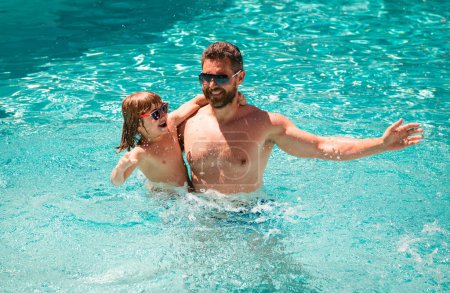 Photo for Father and son swimming in pool, summer family weekeng - Royalty Free Image