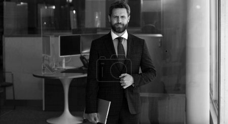 Photo for Portrait of businessman in front of modern office - Royalty Free Image