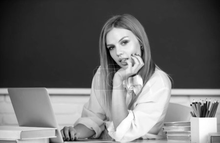 Photo for Portrait of cute attractive young woman student in university or high school college. - Royalty Free Image