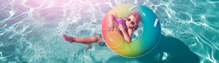 Photo for Child summer vacation. Summertime kids weekend. Boy in swiming pool - Royalty Free Image