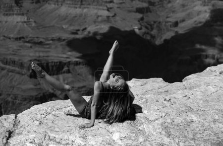 Sex woman on canyon. Orgasm nature landscape. Crazy girl concept