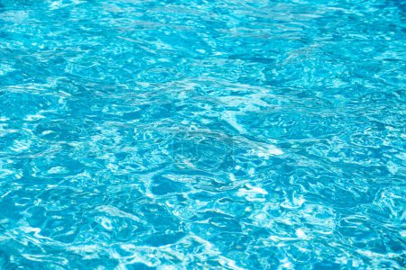 Photo for Water background, ripple waves. Blue swiming pool pattern. Sea surface. Water in swimming pool with sun reflection. Banner with copy space - Royalty Free Image