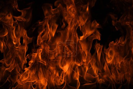 Foto de Aislamiento de llama de fuego sobre fondo negro. Quemar llamas, textura abstracta. Diseño de arte para patrón de fuego, textura de llama - Imagen libre de derechos