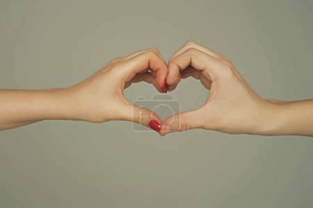 Photo for Female and male hands in form of heart. Hands in shape of love hearts. Heart from hands. Love, friendship concept. Man and woman hand in heart form love. Human hold hand gesturing heart shape symbol - Royalty Free Image