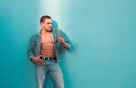 Photo for Jeanse fashion. Man bare torso. Naked male body. Sexy muscular guy. Nude abs - Royalty Free Image