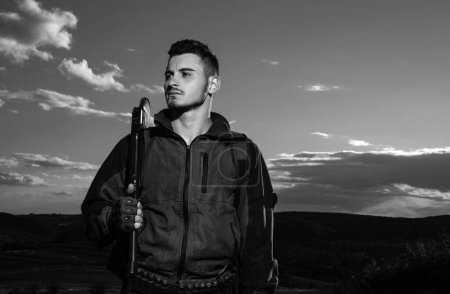 Young hunter. American hunting rifles. Hunting without borders. Hunter with shotgun gun on hunt. Portrait of handsome Hunter
