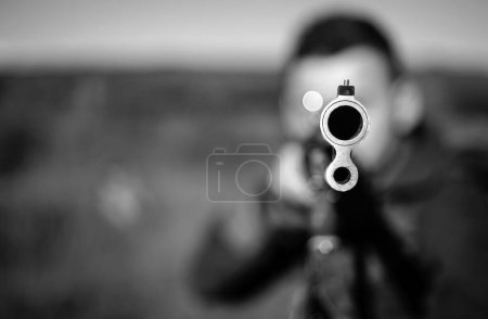 Photo for Hunter with shotgun gun on hunt. Barrel of a gun. Track down. Copy space for text. Hunting gun - Royalty Free Image