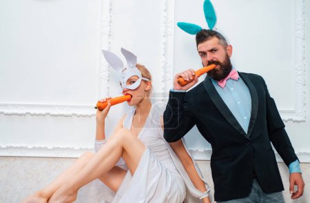 Photo for Sexy easter egg couple. Smile easter. Sexy bunny rabbit couple. Easter bunny dress - Royalty Free Image