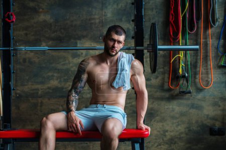 Photo for Handsome man preparing for workout. Sport. Weight workout. Guy doing bodybuilding workout in gym. Sport, bodybuilding and fitness. Man exercising with dumbbell. Hard workout - Royalty Free Image