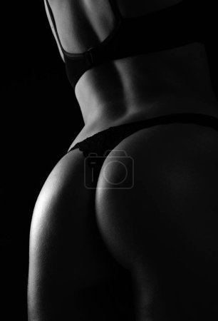 Photo for Sexy big ass in erotic lingerie closeup. Great ass. Sexy female wearing pants. Sexual girl takes off underwear. Seductive woman with beautiful butt, undressed and stripper concept - Royalty Free Image