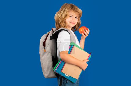 Photo for School teenager child with book and copybook. Teenager student, isolated background. Go study. Education learning and knowledge. Portrait of happy smiling school kid. Positive emotions - Royalty Free Image