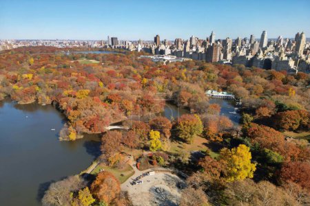 Autumn in Central Park in New York. NYC Central Park with Fall autumnal foliage. Aerial shot of Central Park in Autumn color. Top view of beautiful fall foliage in Central Park NYC