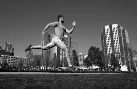Photo for Athletic young man running in San Diego city - Royalty Free Image