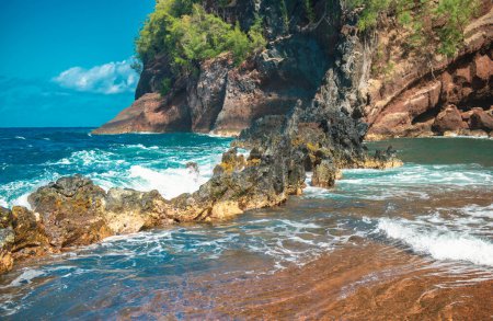 Photo for Waves on a rocky beach. Tropical paradise deep turquoise rocky seascape - Royalty Free Image
