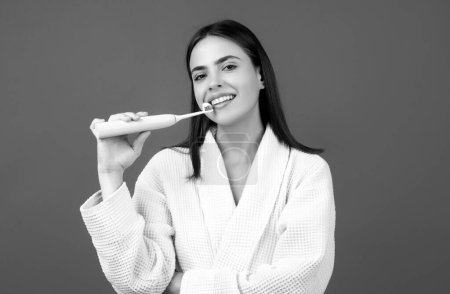 Photo for Closeup portrait of womans toothy smile against a isolated background with copy space. Girl brushing her teeth. Dental concept. Beautiful young woman smile. Dental health - Royalty Free Image