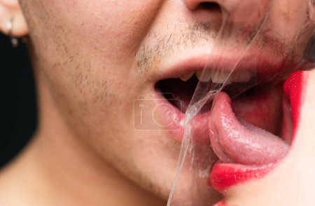 Photo for Couple kissing through transparent plastic. Girl sexy tongue lick guy. Safe sex. Oral condom concept. Protecting health. Health protection. Sexually transmitted diseases. Sexual activity. Sex health. - Royalty Free Image