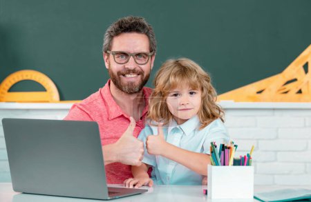 Photo for Back to school. First day at school. Cute little boy studying lesson in class - Royalty Free Image