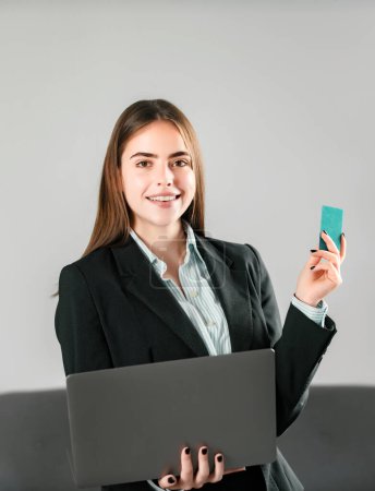 Portrait of young businesswoman accountant in formal wear at office work place. Successful female manager, beautiful secretary girl. Financial services, credit card banking concept