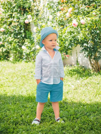 Photo for Adorable cool summer style child boy oudoor. Kids fashion - Royalty Free Image
